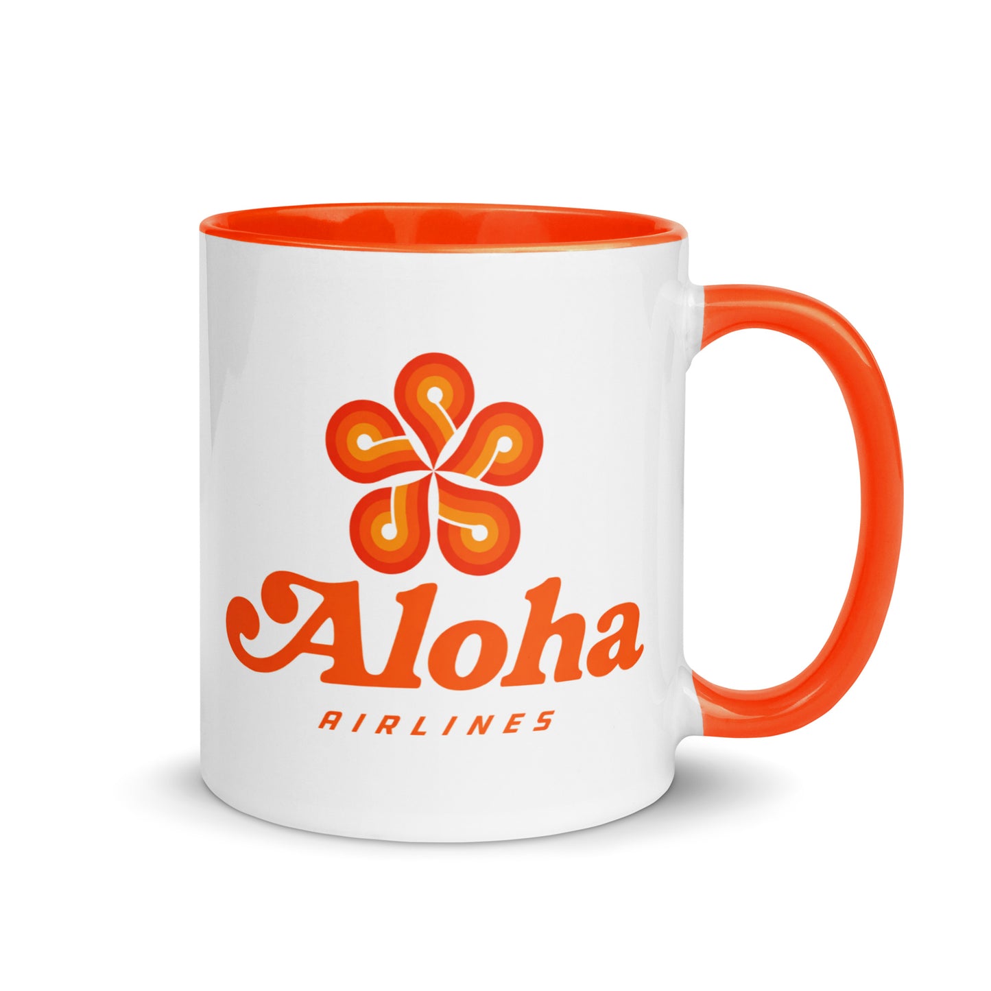Aloha Airlines logo coffee mug featuring the classic Hawaiian flower emblem on a white ceramic mug with orange handle, perfect for aviation enthusiasts and island travel collectors.