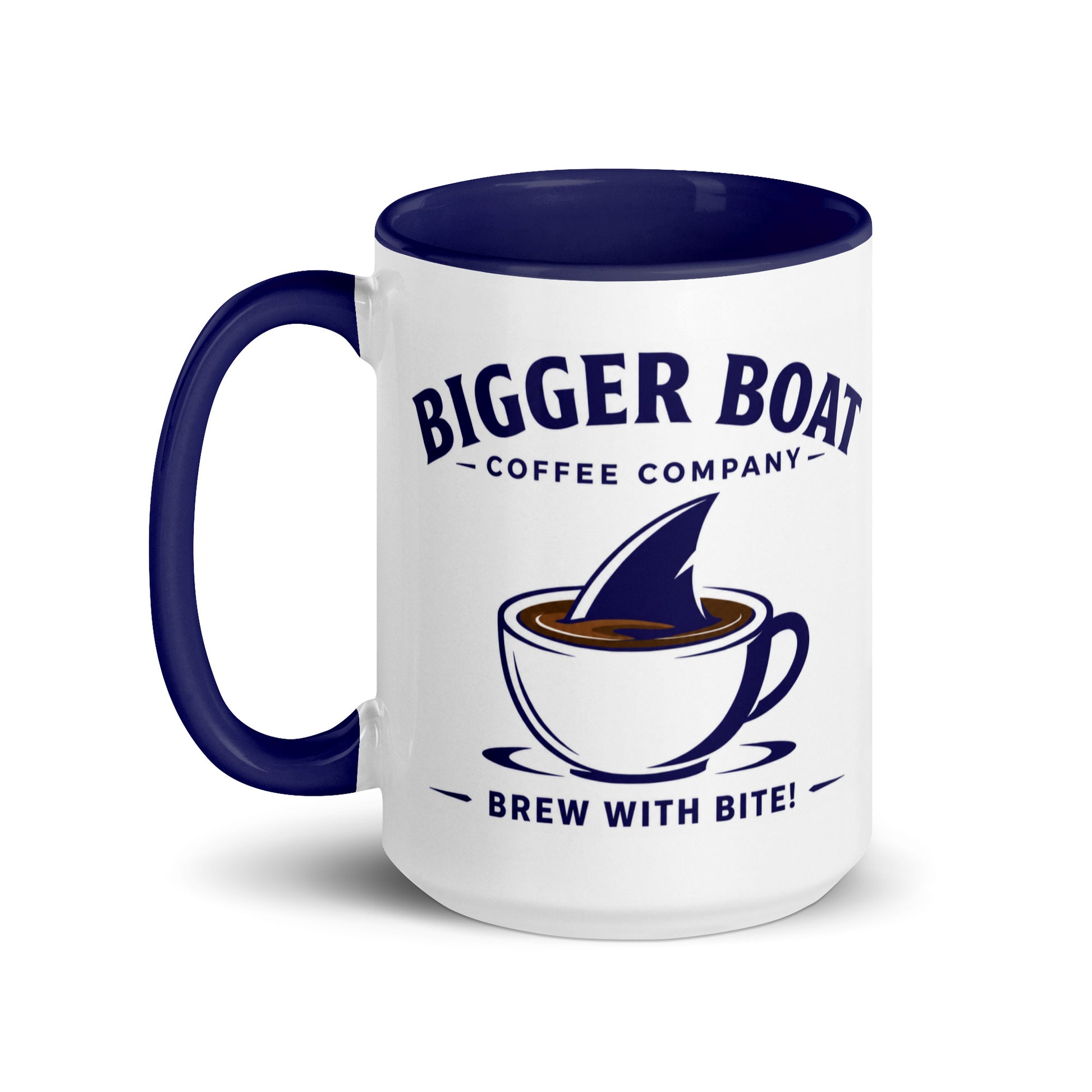 Bigger Boat Coffee Company shark fin coffee mug featuring the Brew With Bite slogan, perfect for shark enthusiasts, coffee lovers, ocean fans, and nautical gift giving.