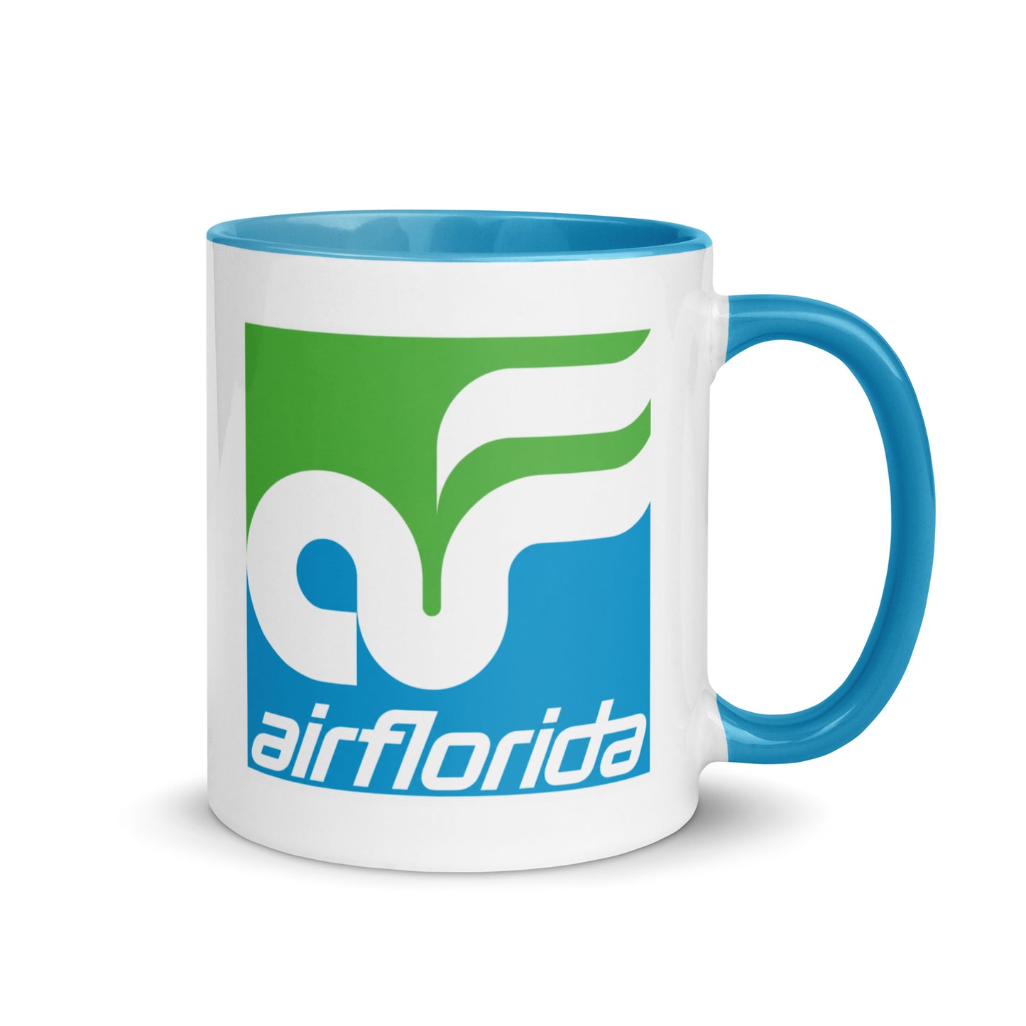 Vintage Air Florida logo 11 oz ceramic coffee mug with classic green and blue airline design and blue handle