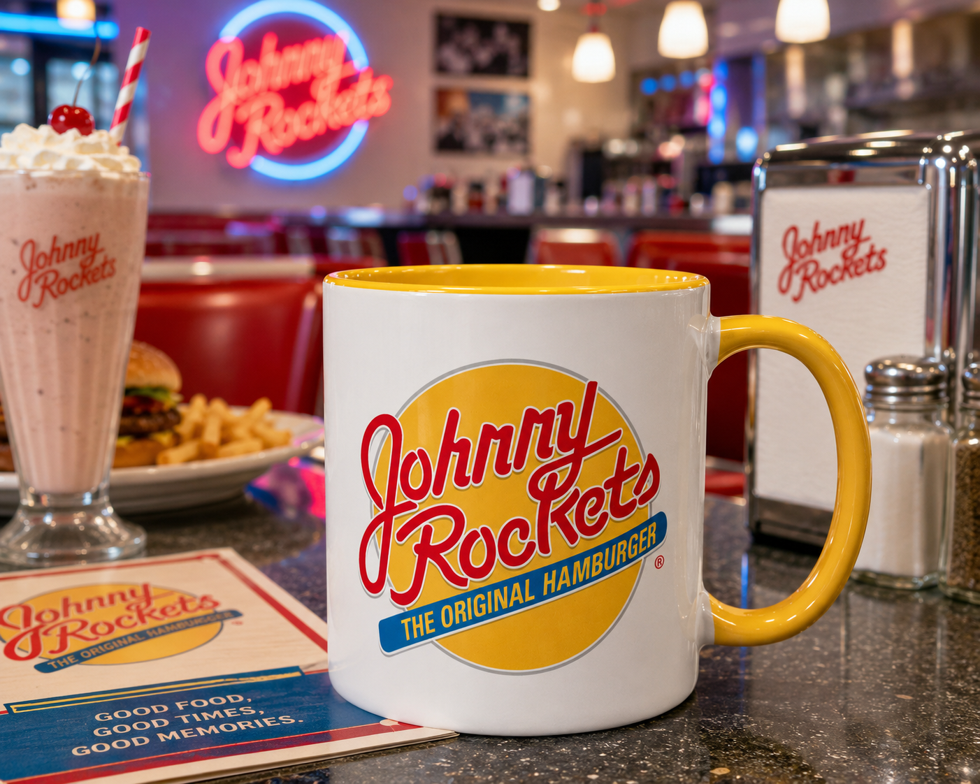 Classic Johnny Rockets coffee mug featuring retro red, yellow and blue restaurant logo on white ceramic with yellow accents