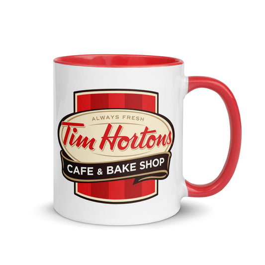 Classic Tim Hortons Café & Bake Shop logo coffee mug featuring the retro Always Fresh design on a white ceramic mug with red handle and interior.