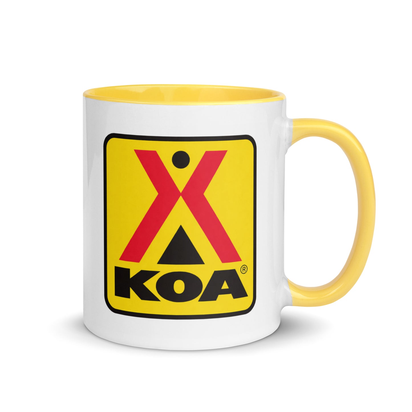 KOA Kampgrounds of America logo coffee mug featuring the classic yellow, red, and black KOA emblem on a white ceramic mug with yellow handle and interior, perfect for RV travelers and camping enthusiasts.