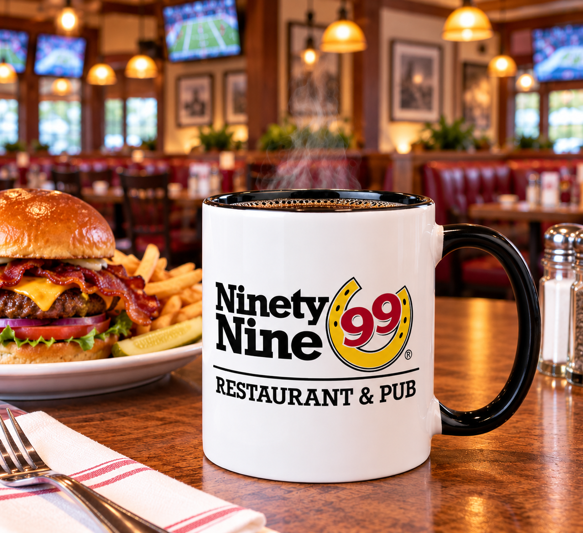 Ninety Nine Restaurant & Pub coffee mug featuring nostalgic 99 restaurant logo with red numbers, yellow horseshoe and black lettering