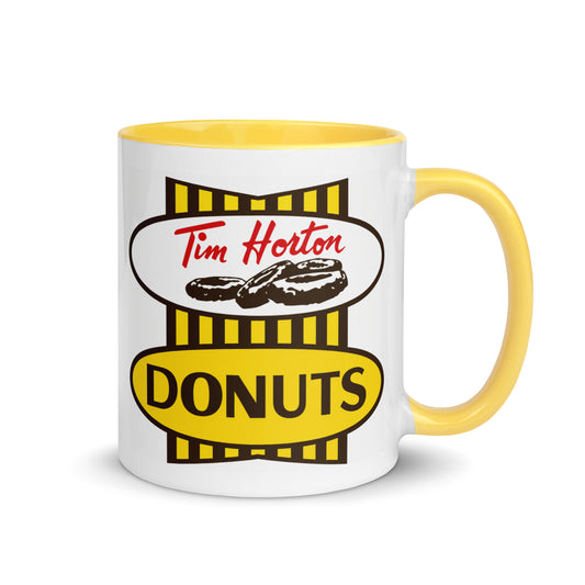 Vintage Tim Hortons Donuts coffee mug featuring classic retro donut shop logo on white ceramic with yellow handle and interior.